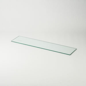 Image shows glass shelf against a white background